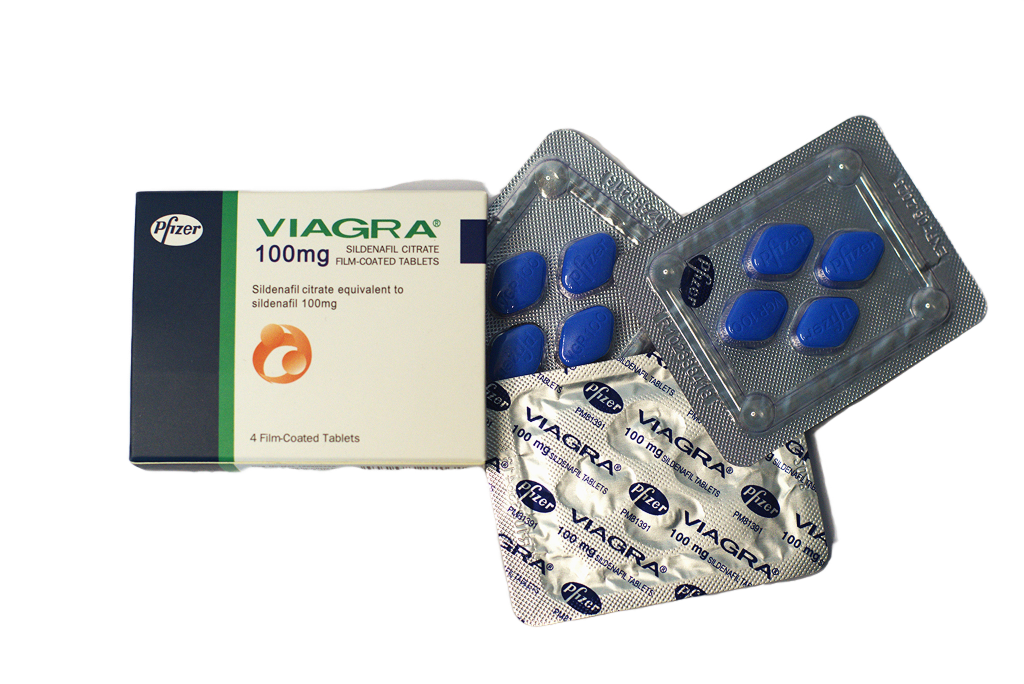 Viagra 100 mg – kutija pored blistera i folije sa plavim tabletama.
